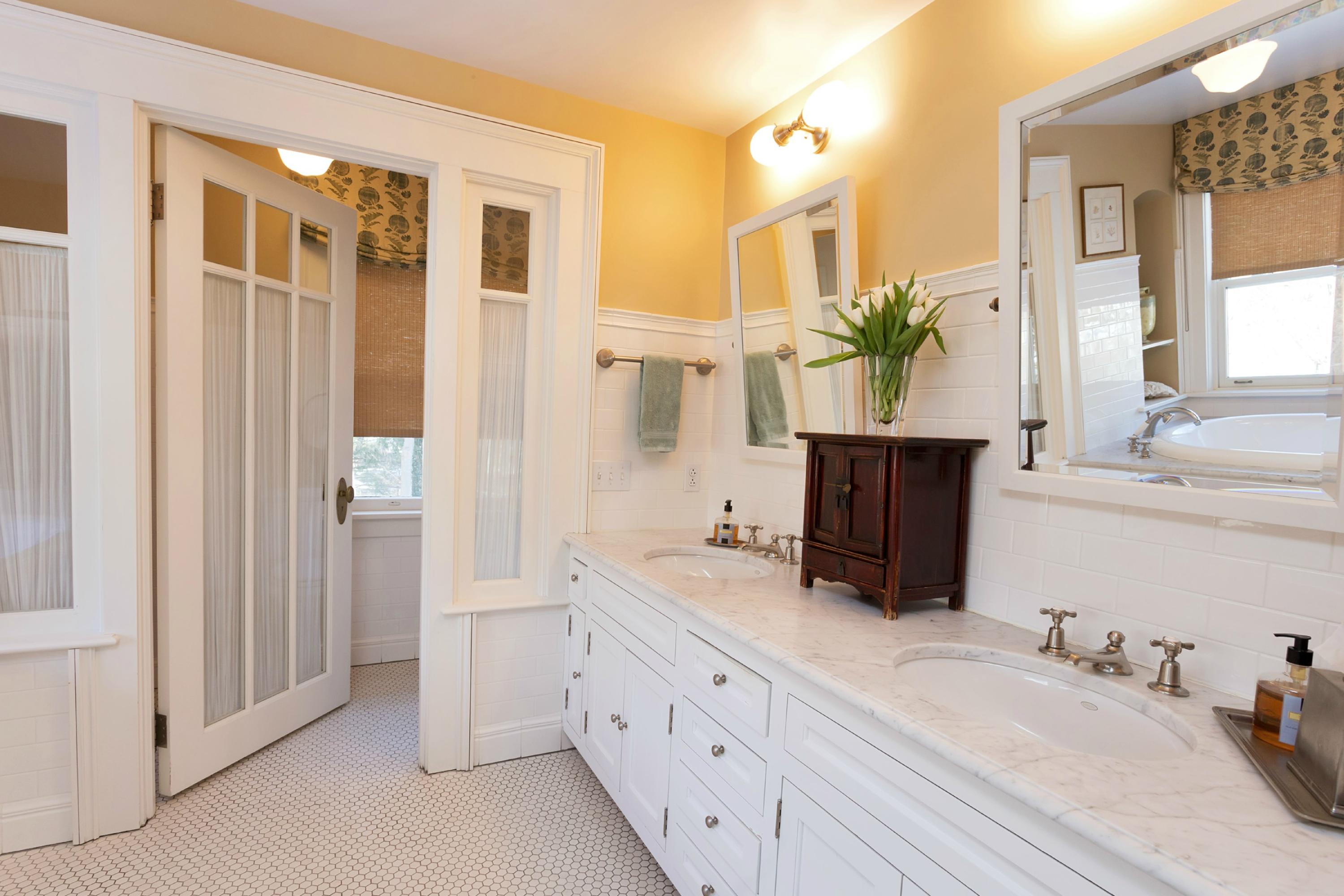 39 Old Farm Road Darien, CT 06820 - Photo 20 of 36 a spacious bathroom with double vanity a mirror and a shower