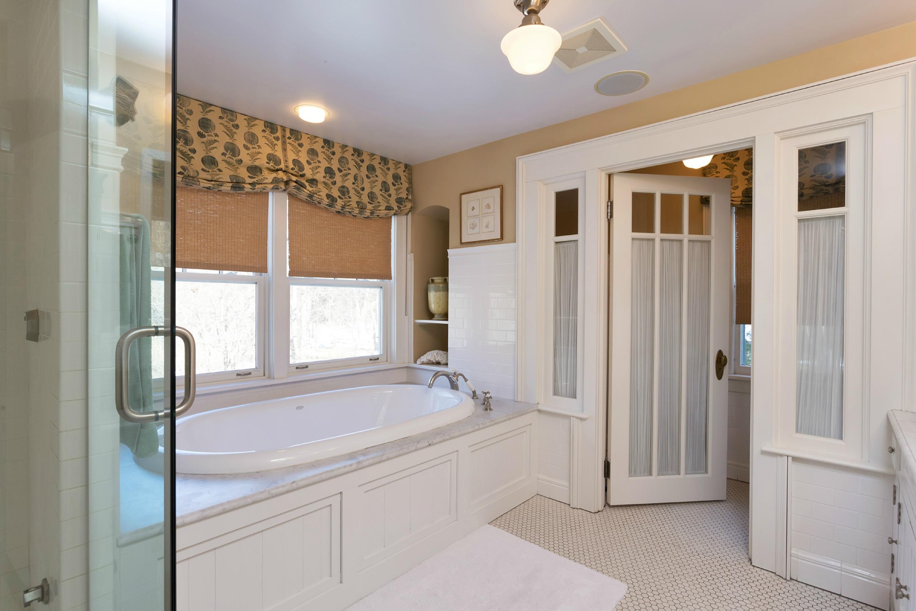 39 Old Farm Road Darien, CT 06820 - Photo 21 of 36 a spacious bathroom with a shower and a bathtub