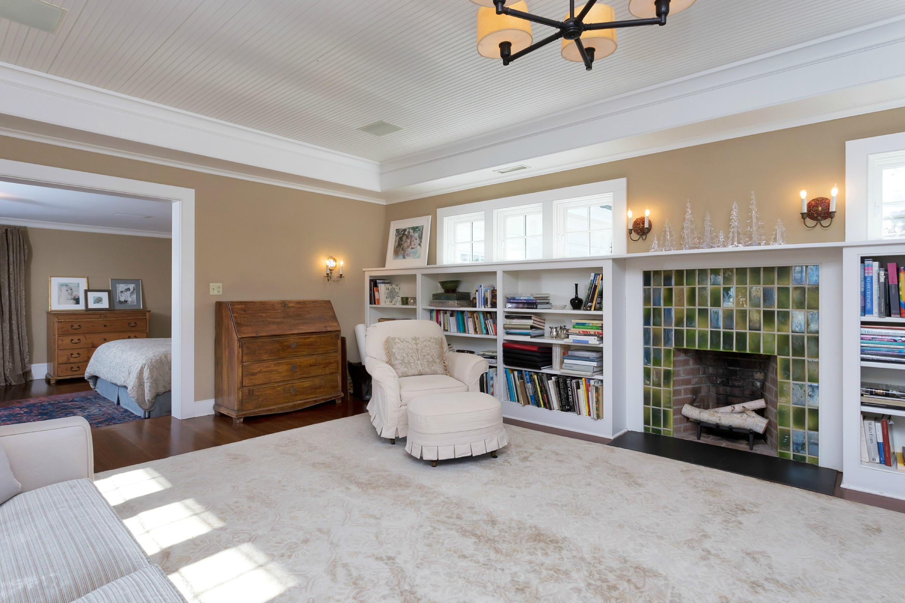 39 Old Farm Road Darien, CT 06820 - Photo 22 of 36 a living room with furniture and a fireplace