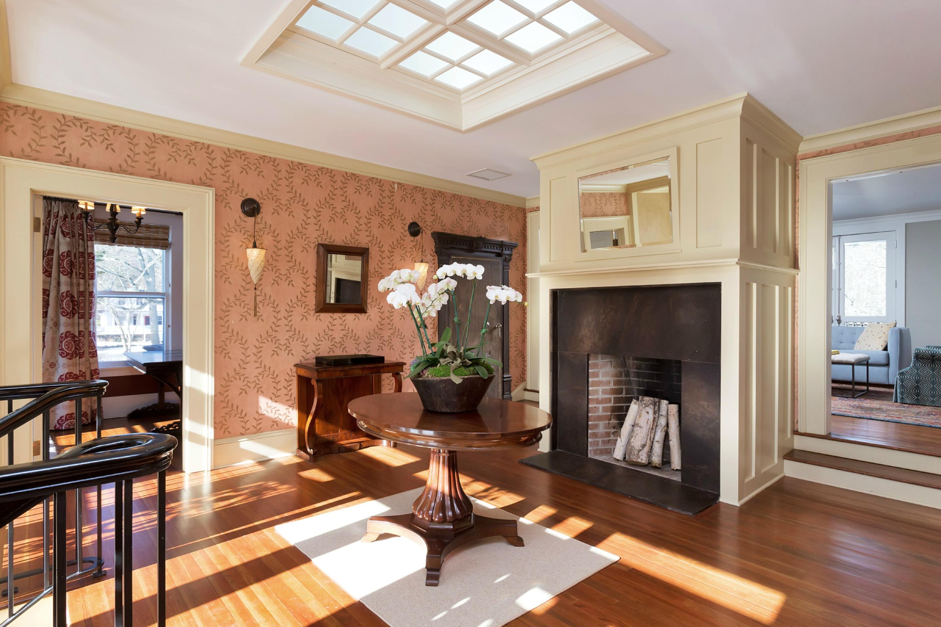 39 Old Farm Road Darien, CT 06820 - Photo 5 of 36 a living room with furniture and a fireplace