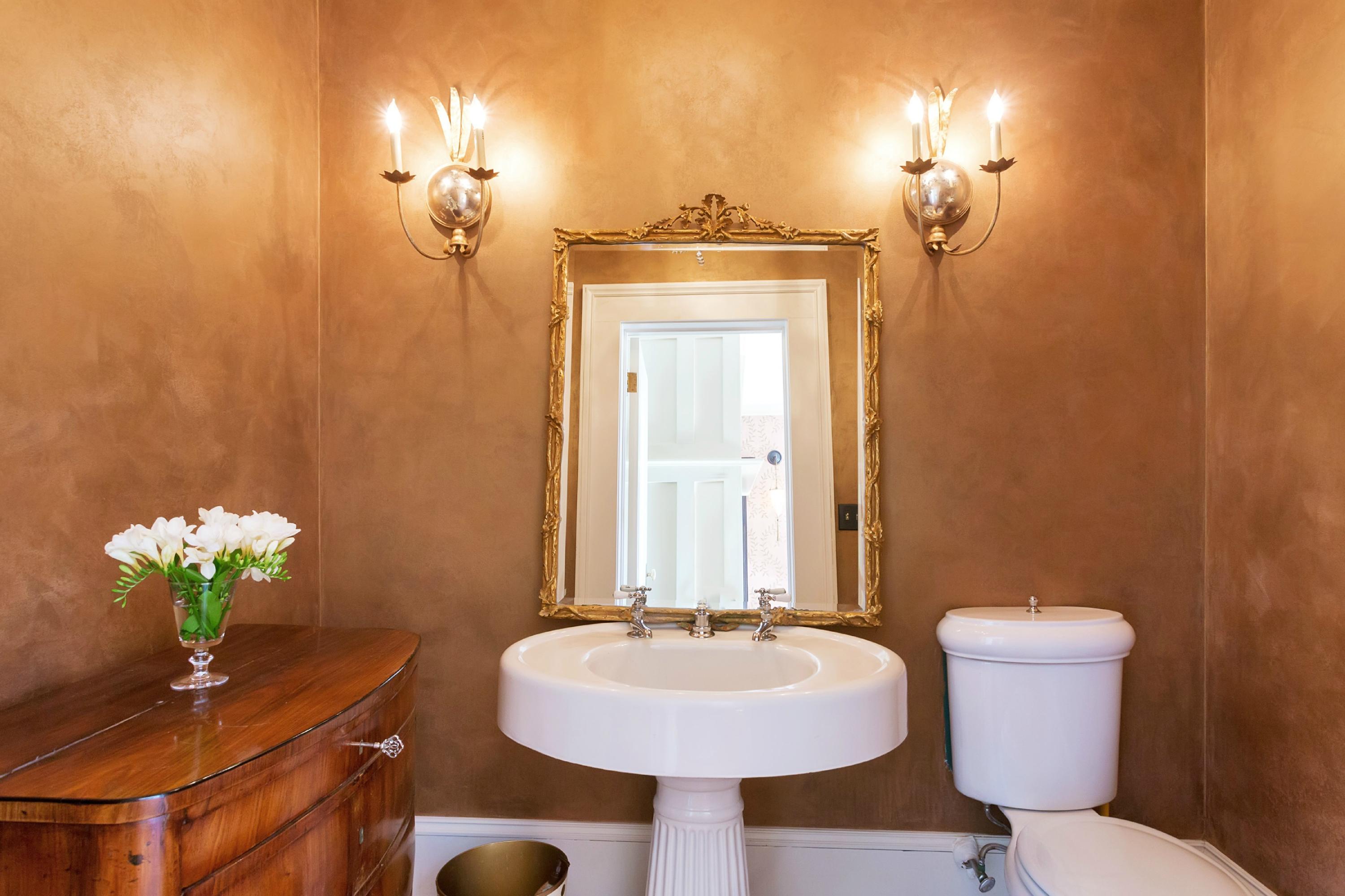 39 Old Farm Road Darien, CT 06820 - Photo 9 of 36 a bathroom with a sink a toilet and mirror