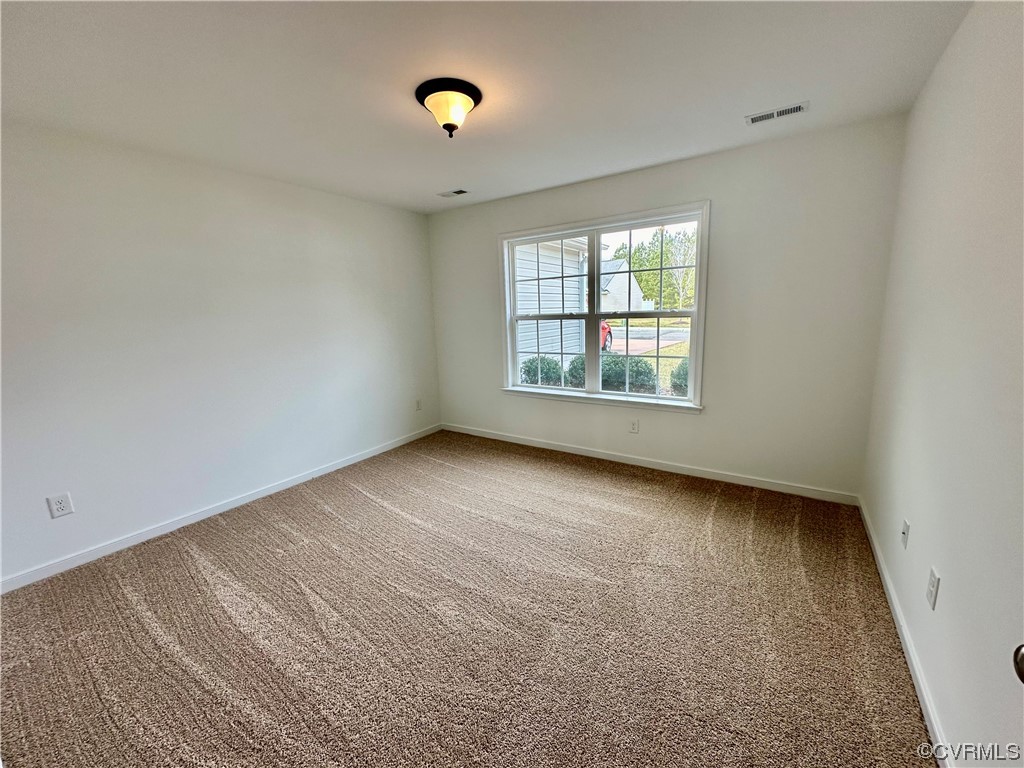 3314 Kennington Park Road Aylett, VA 23009 - Photo 18 of 36 an empty room with a window and closet area