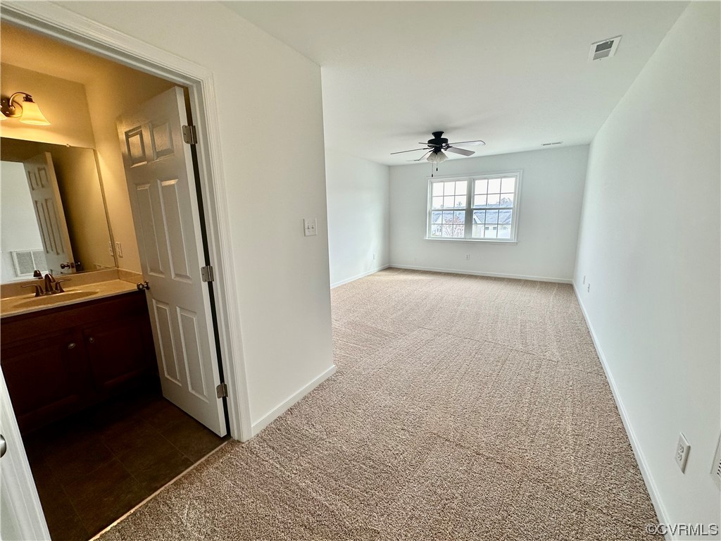 3314 Kennington Park Road Aylett, VA 23009 - Photo 21 of 36 a view of a hallway to a livingroom with a window