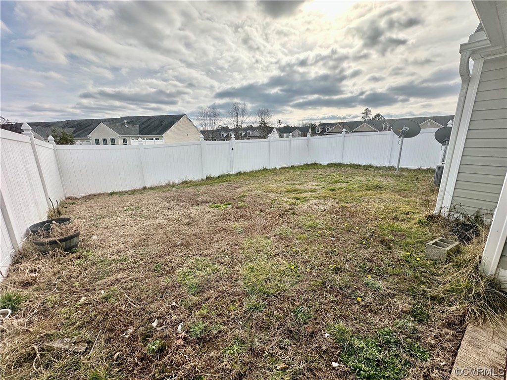 3314 Kennington Park Road Aylett, VA 23009 - Photo 32 of 36 a view of a swimming pool with an outdoor seating and a yard
