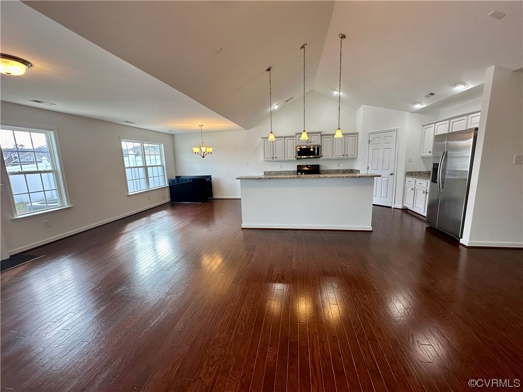 3314 Kennington Park Road Aylett, VA 23009 - Photo 4 of 36 a view of a living room and kitchen with wooden floor