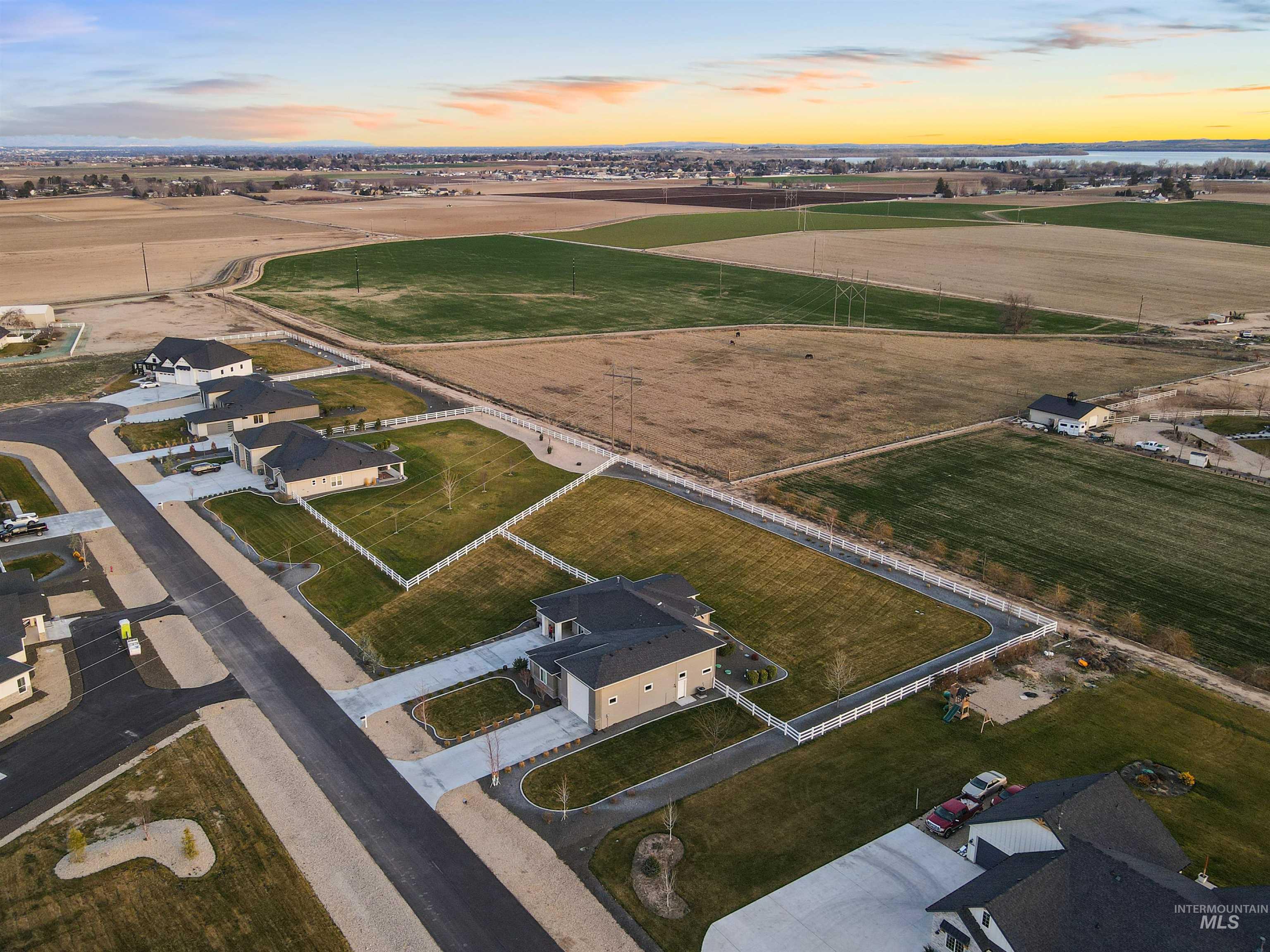 16901 Spring Meadow Drive Caldwell, ID 83607 - Photo 1 of 50 Aerial view at dusk of a view of rural / pastoral area