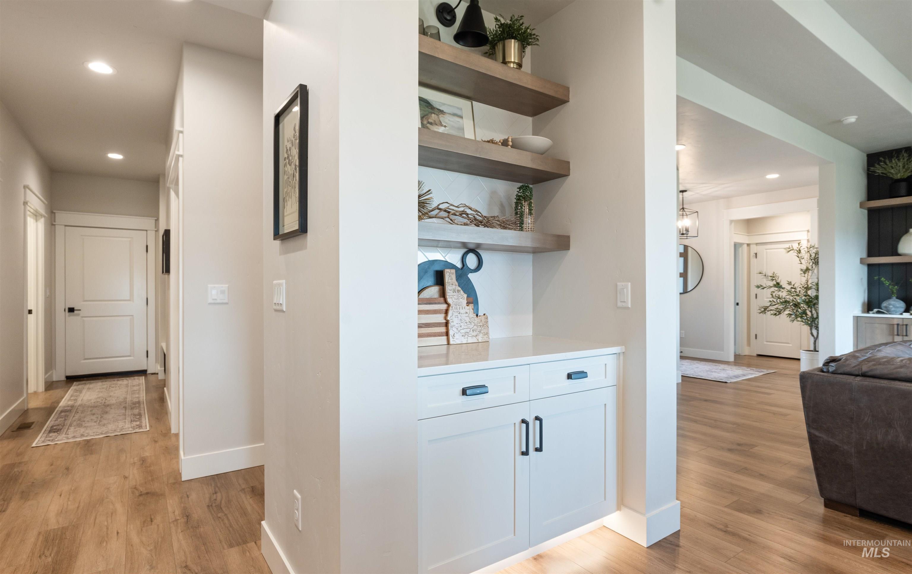16901 Spring Meadow Drive Caldwell, ID 83607 - Photo 23 of 50 Hall featuring recessed lighting and light wood-type flooring