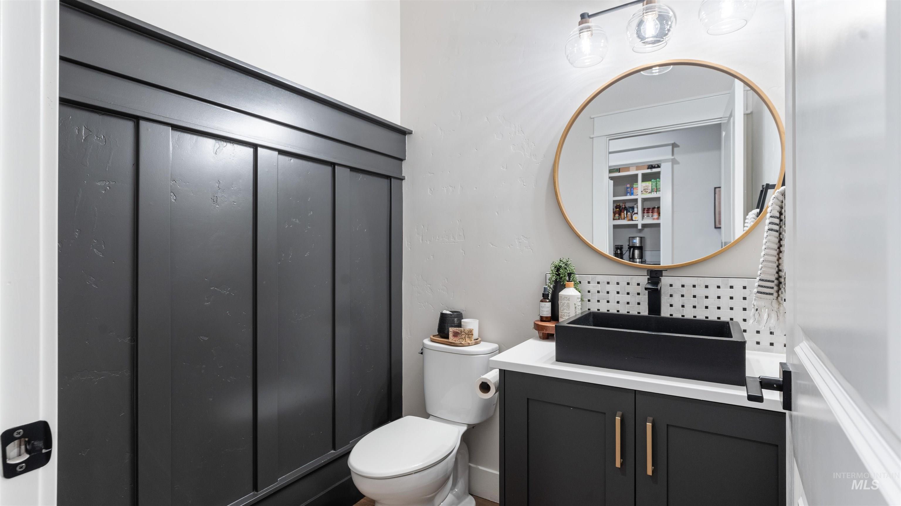 16901 Spring Meadow Drive Caldwell, ID 83607 - Photo 25 of 50 Bathroom featuring toilet and vanity