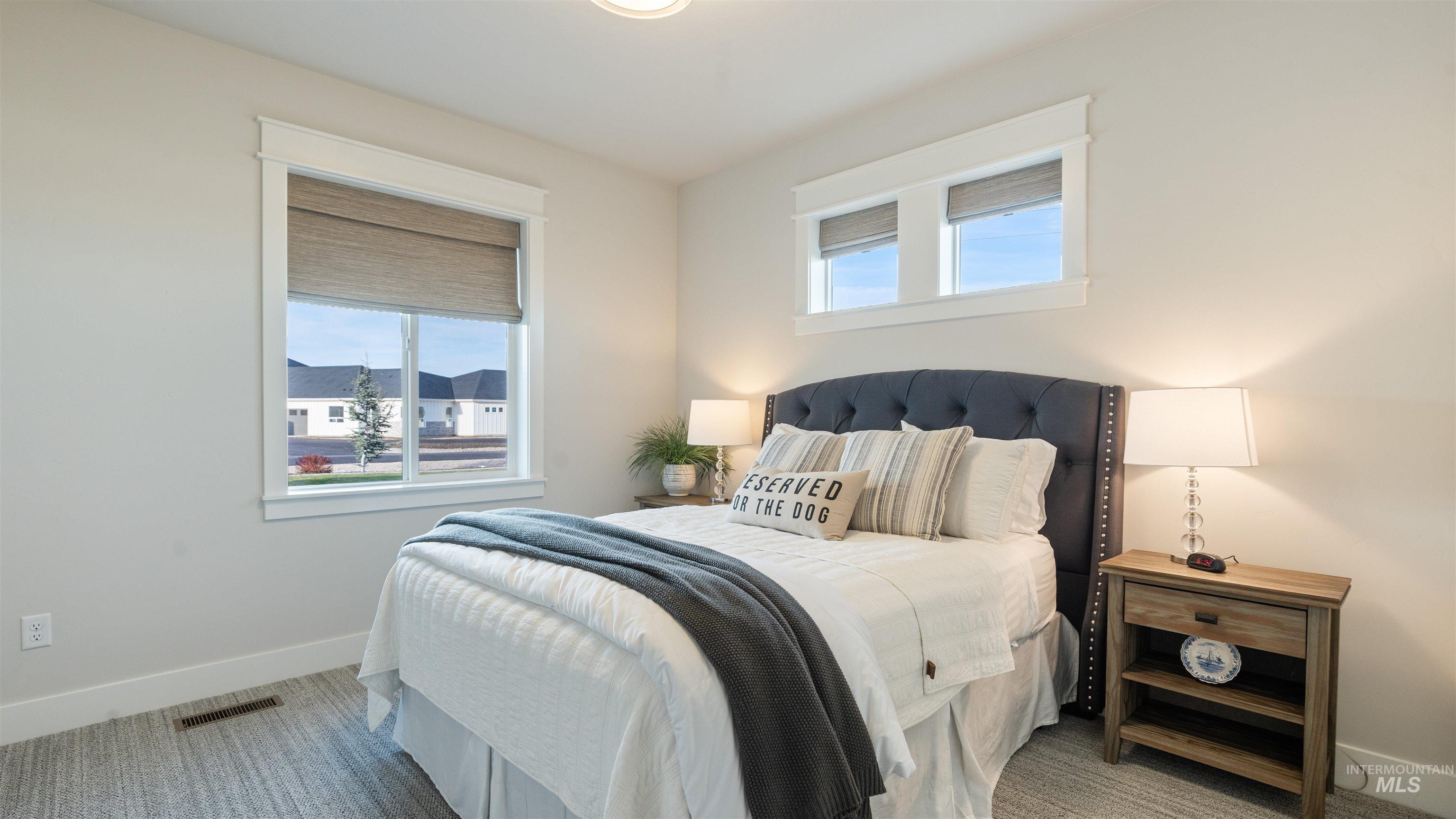 16901 Spring Meadow Drive Caldwell, ID 83607 - Photo 27 of 50 Bedroom featuring multiple windows