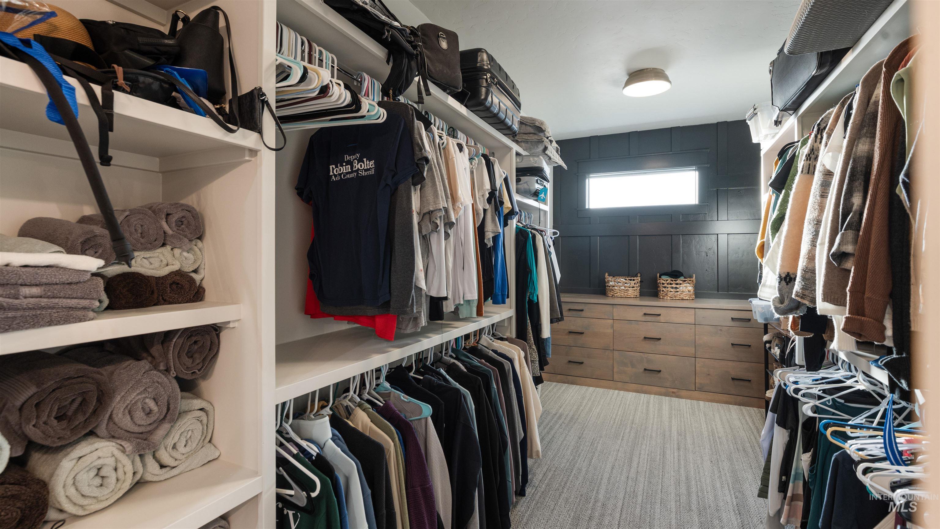 16901 Spring Meadow Drive Caldwell, ID 83607 - Photo 37 of 50 Walk in closet featuring light carpet
