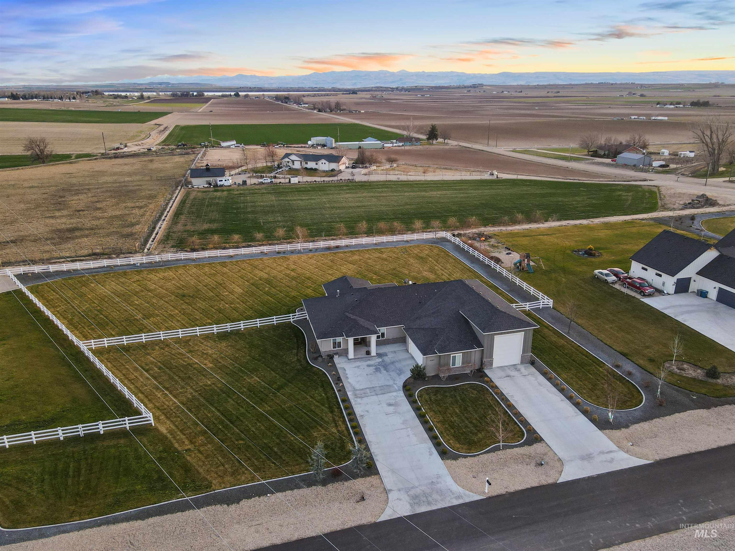 16901 Spring Meadow Drive Caldwell, ID 83607 - Photo 40 of 50 Aerial view at dusk of a rural view