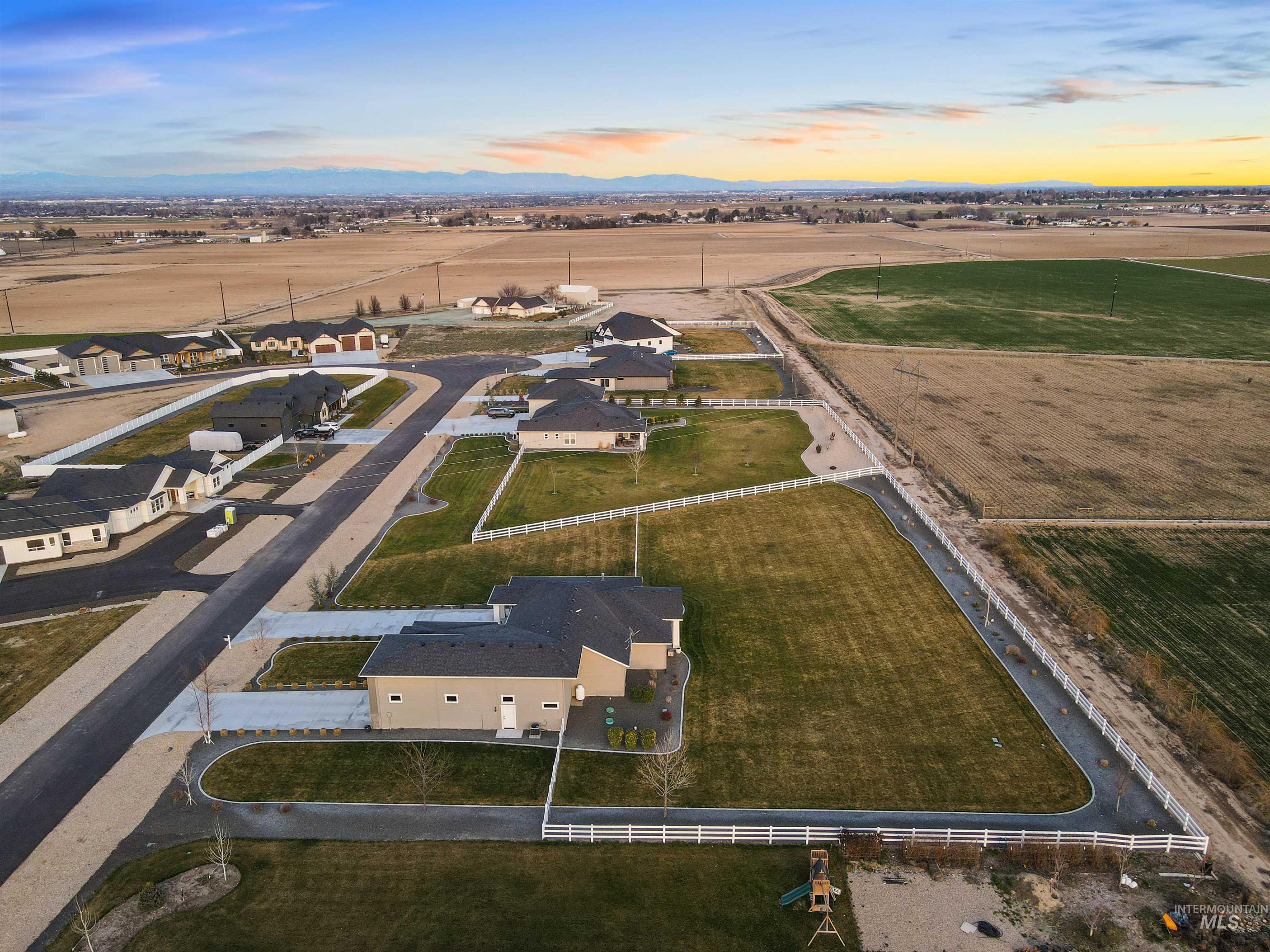 16901 Spring Meadow Drive Caldwell, ID 83607 - Photo 42 of 50 Aerial view at dusk of a rural view and a mountain view