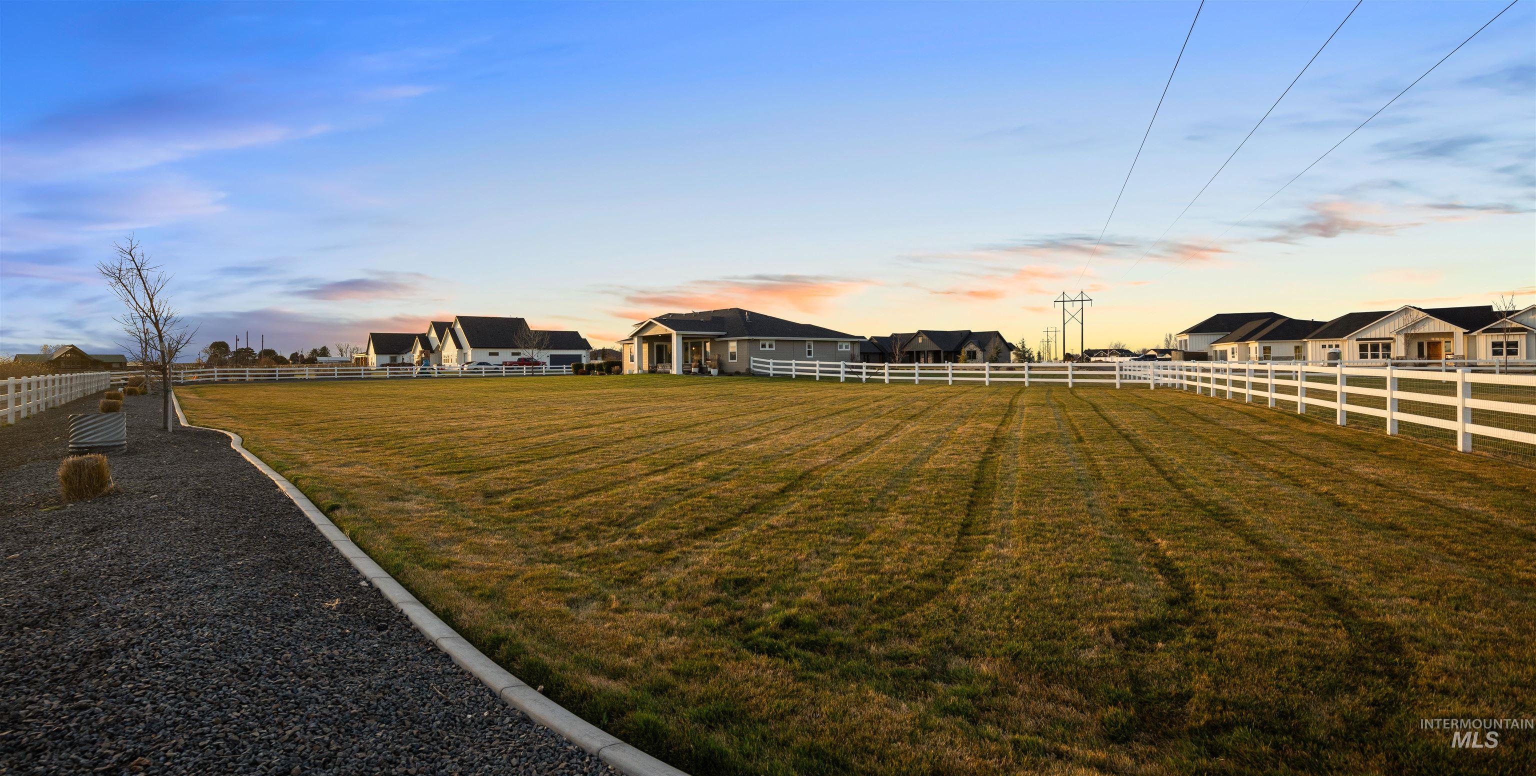 16901 Spring Meadow Drive Caldwell, ID 83607 - Photo 9 of 50 View of yard featuring a residential view