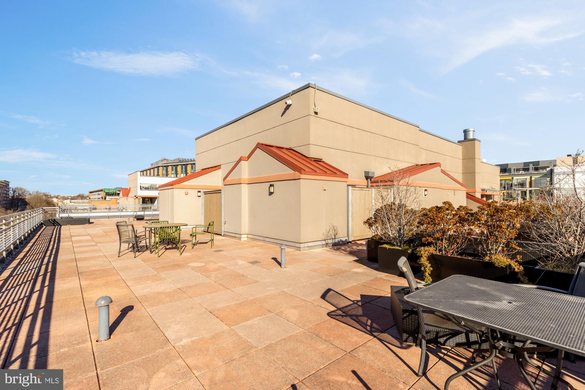 2120 Vermont Avenue Northwest, Unit 411 Washington, DC 20001 - Photo 24 of 27 a view of a terrace with chairs and potted plants