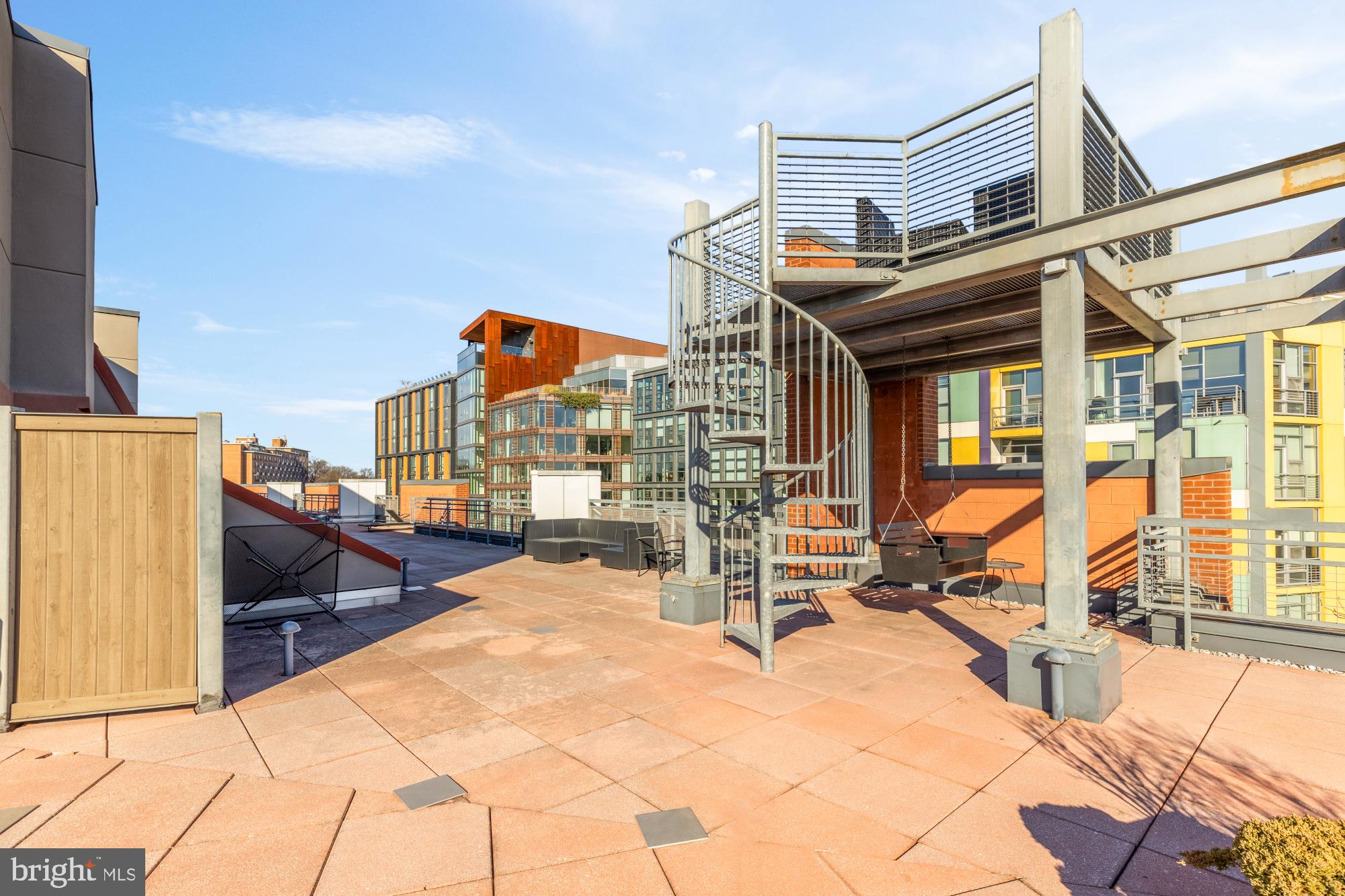 2120 Vermont Avenue Northwest, Unit 411 Washington, DC 20001 - Photo 25 of 27 a building exterior with furniture