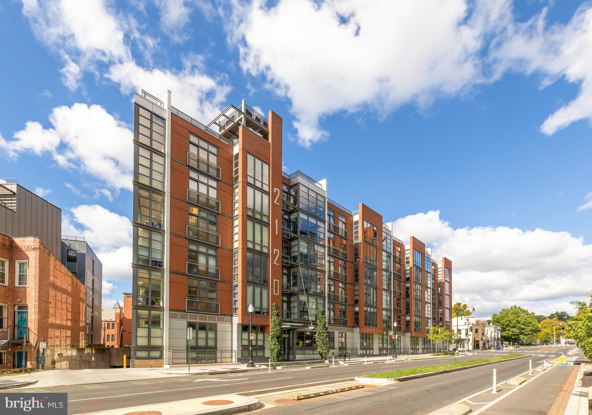 2120 Vermont Avenue Northwest, Unit 411 Washington, DC 20001 - Photo 8 of 27 a city street lined with tall buildings