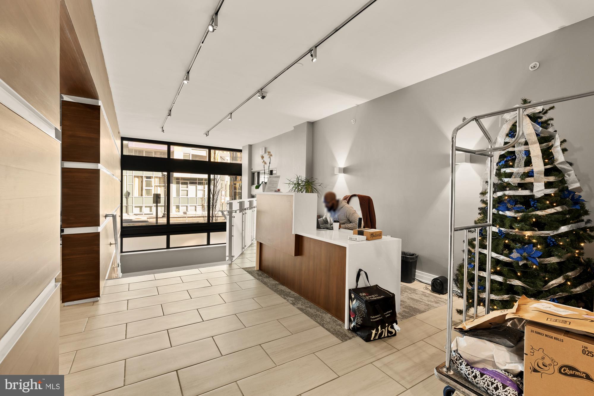 2120 Vermont Avenue Northwest, Unit 411 Washington, DC 20001 - Photo 9 of 27 a room with gym equipment and a large window