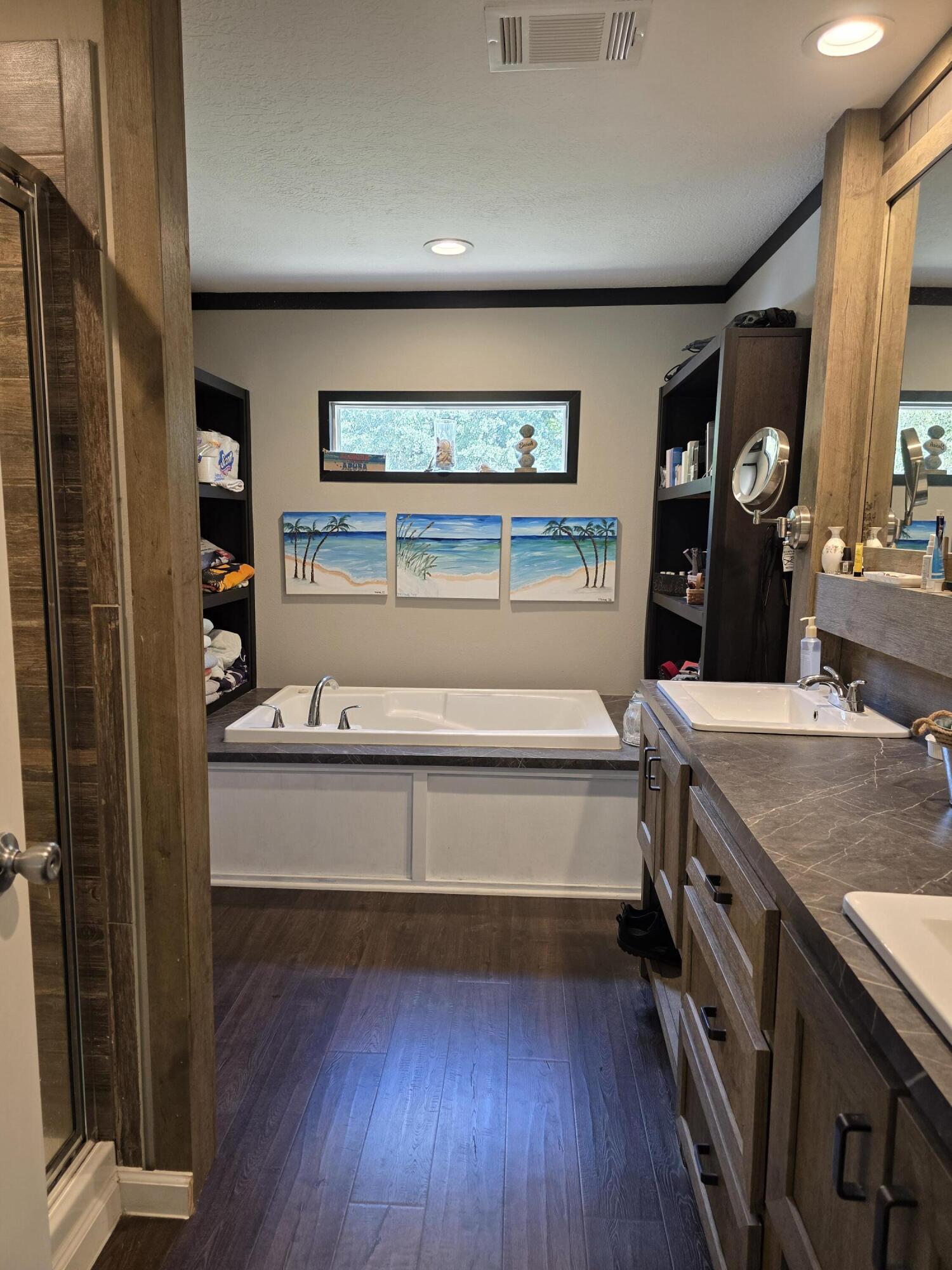 4320 Highway 79 Vernon, FL 32462 - Photo 23 of 49 a bathroom with a sink and a bathtub