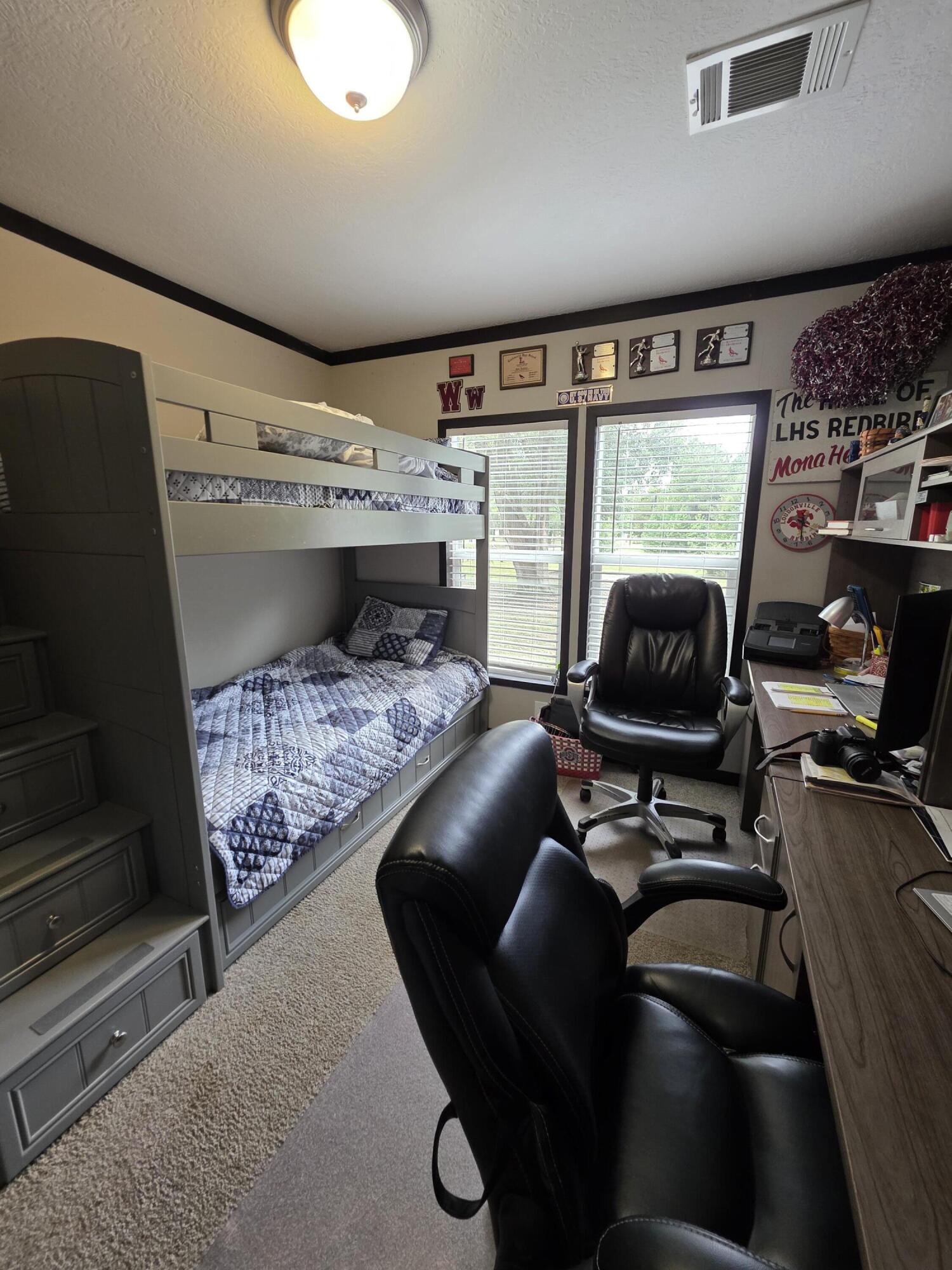 4320 Highway 79 Vernon, FL 32462 - Photo 30 of 49 a living room with furniture and a flat screen tv