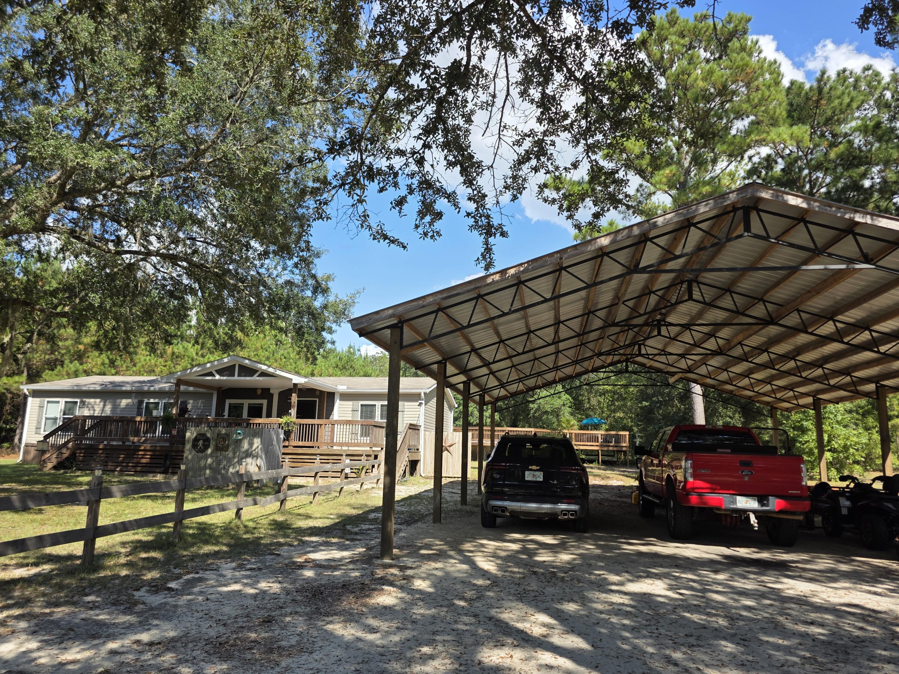 4320 Highway 79 Vernon, FL 32462 - Photo 41 of 49 a view of a car park in front of house