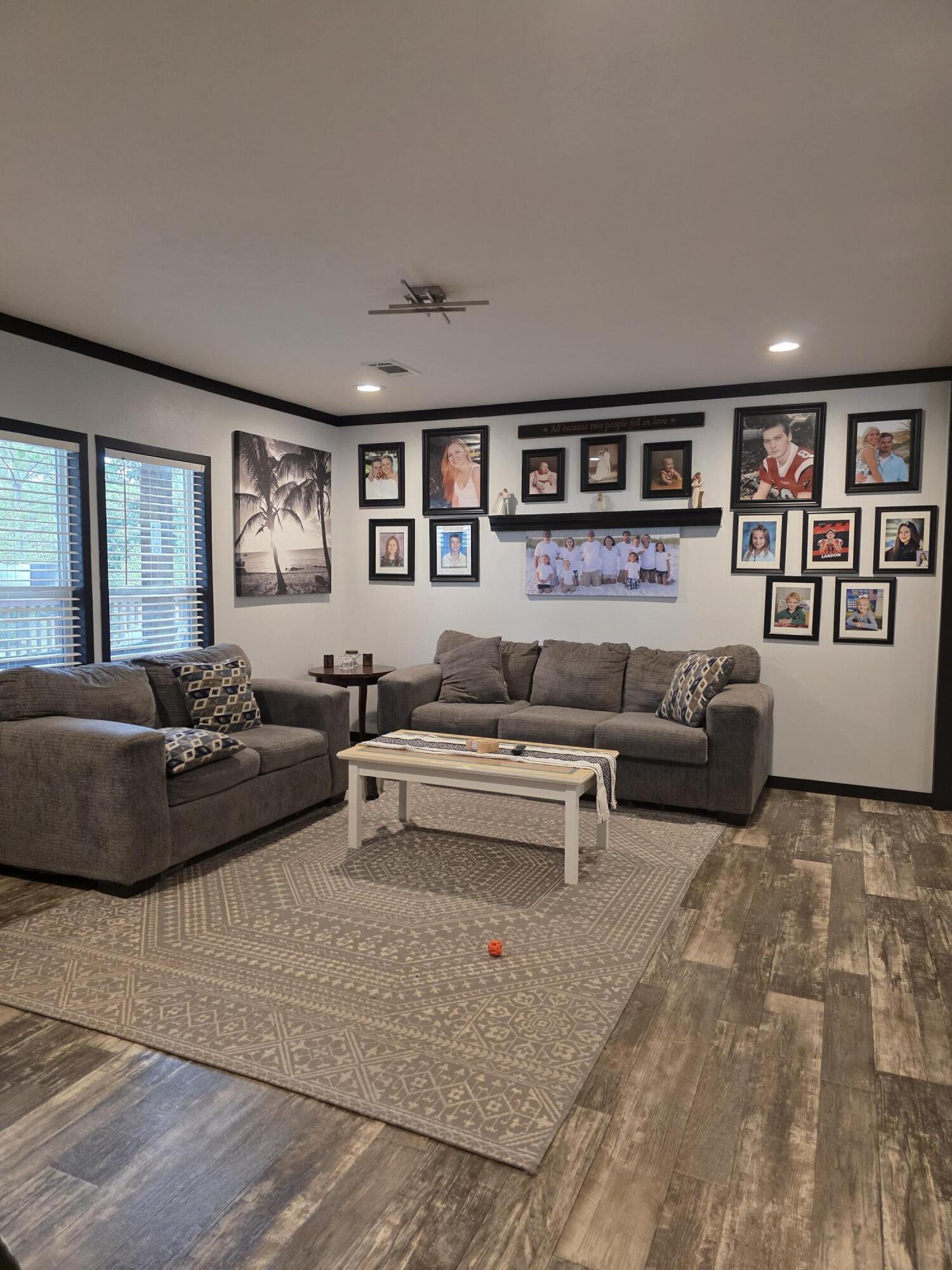 4320 Highway 79 Vernon, FL 32462 - Photo 8 of 49 a living room with furniture and paintings on the wall