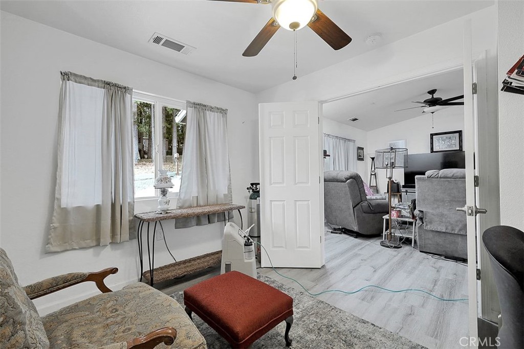 14141 Racine Circle Magalia, CA 95954 - Photo 11 of 53 a living room with furniture and a window