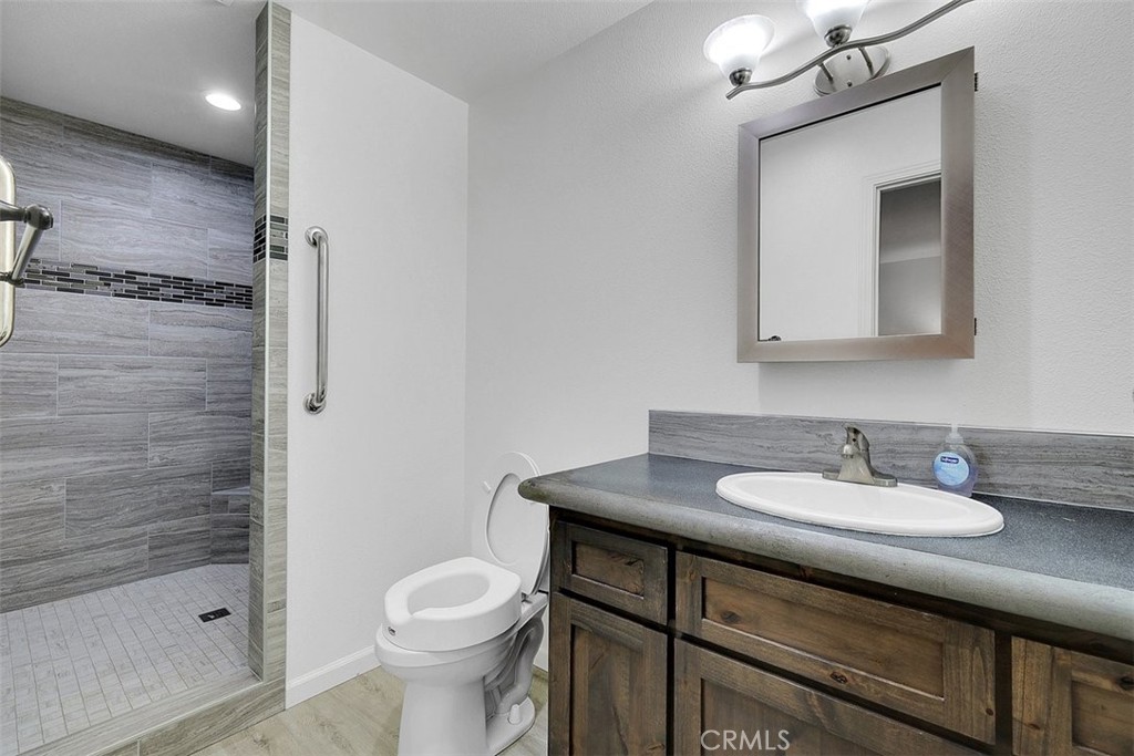 14141 Racine Circle Magalia, CA 95954 - Photo 20 of 53 a bathroom with a sink toilet and shower
