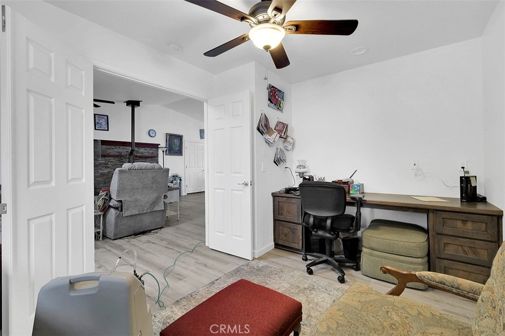 14141 Racine Circle Magalia, CA 95954 - Photo 21 of 53 a view of a livingroom with workspace and a window