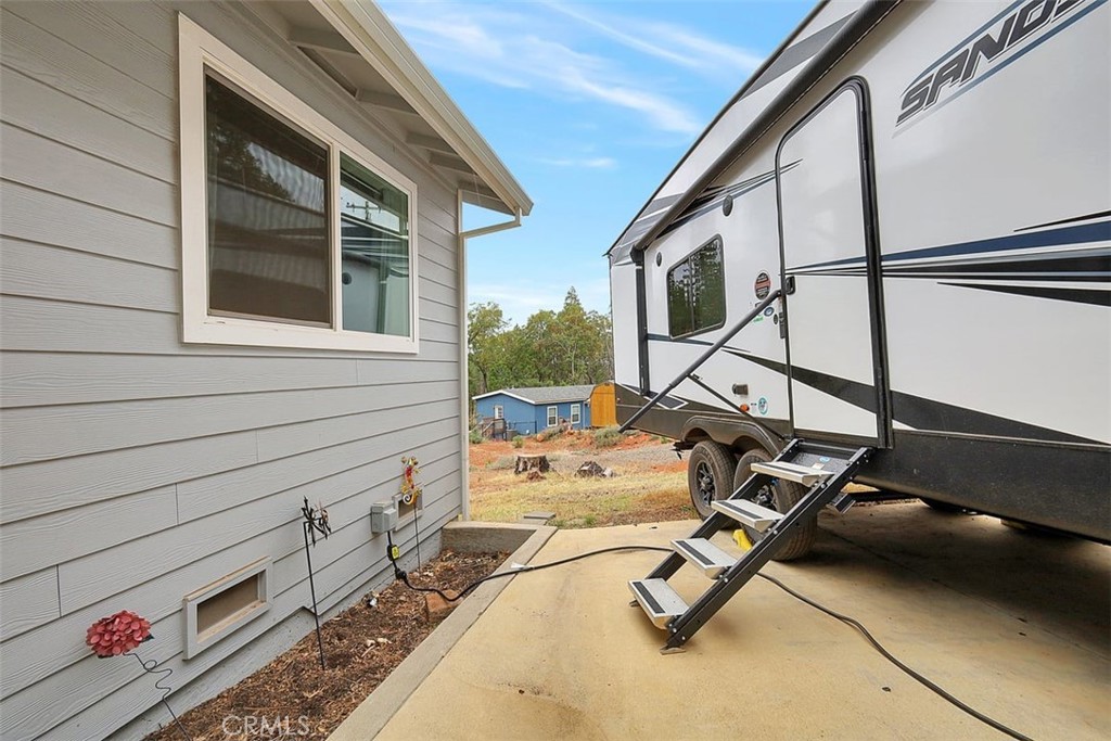 14141 Racine Circle Magalia, CA 95954 - Photo 28 of 53 a view of backyard with a large window