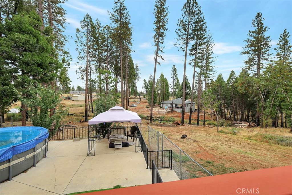 14141 Racine Circle Magalia, CA 95954 - Photo 39 of 53 a view of a tennis ground with large trees