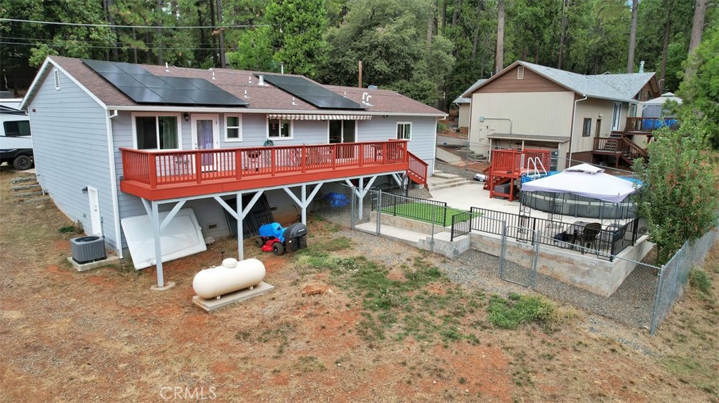 14141 Racine Circle Magalia, CA 95954 - Photo 42 of 53 an aerial view of a house with table and chairs
