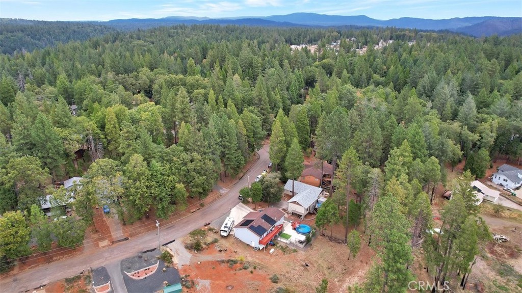 14141 Racine Circle Magalia, CA 95954 - Photo 49 of 53 a view of a city with lush green forest