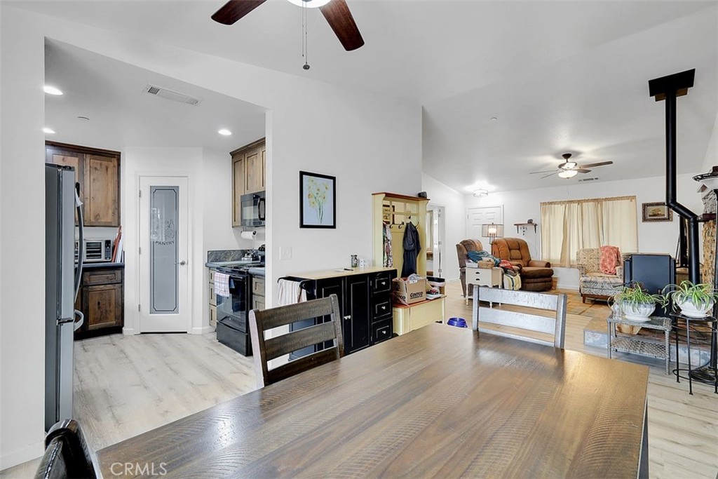 14141 Racine Circle Magalia, CA 95954 - Photo 5 of 53 a living room with furniture and a wooden floor