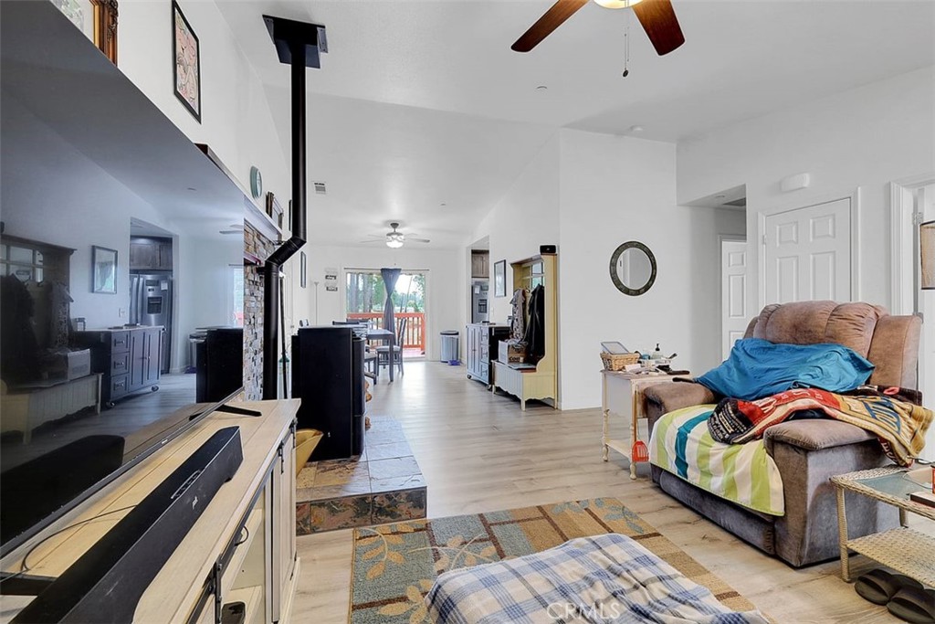 14141 Racine Circle Magalia, CA 95954 - Photo 6 of 53 a living room with furniture and a flat screen tv