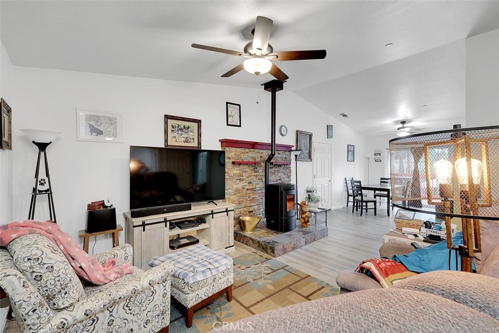 14141 Racine Circle Magalia, CA 95954 - Photo 7 of 53 a living room with furniture and a flat screen tv