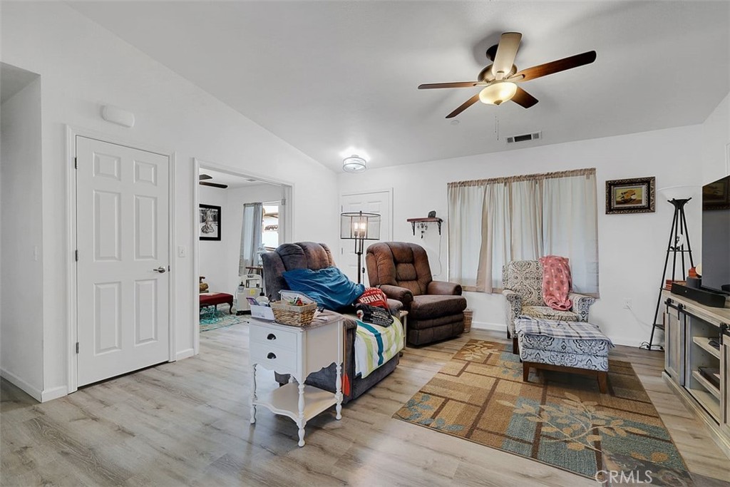 14141 Racine Circle Magalia, CA 95954 - Photo 8 of 53 a living room with furniture and a flat screen tv