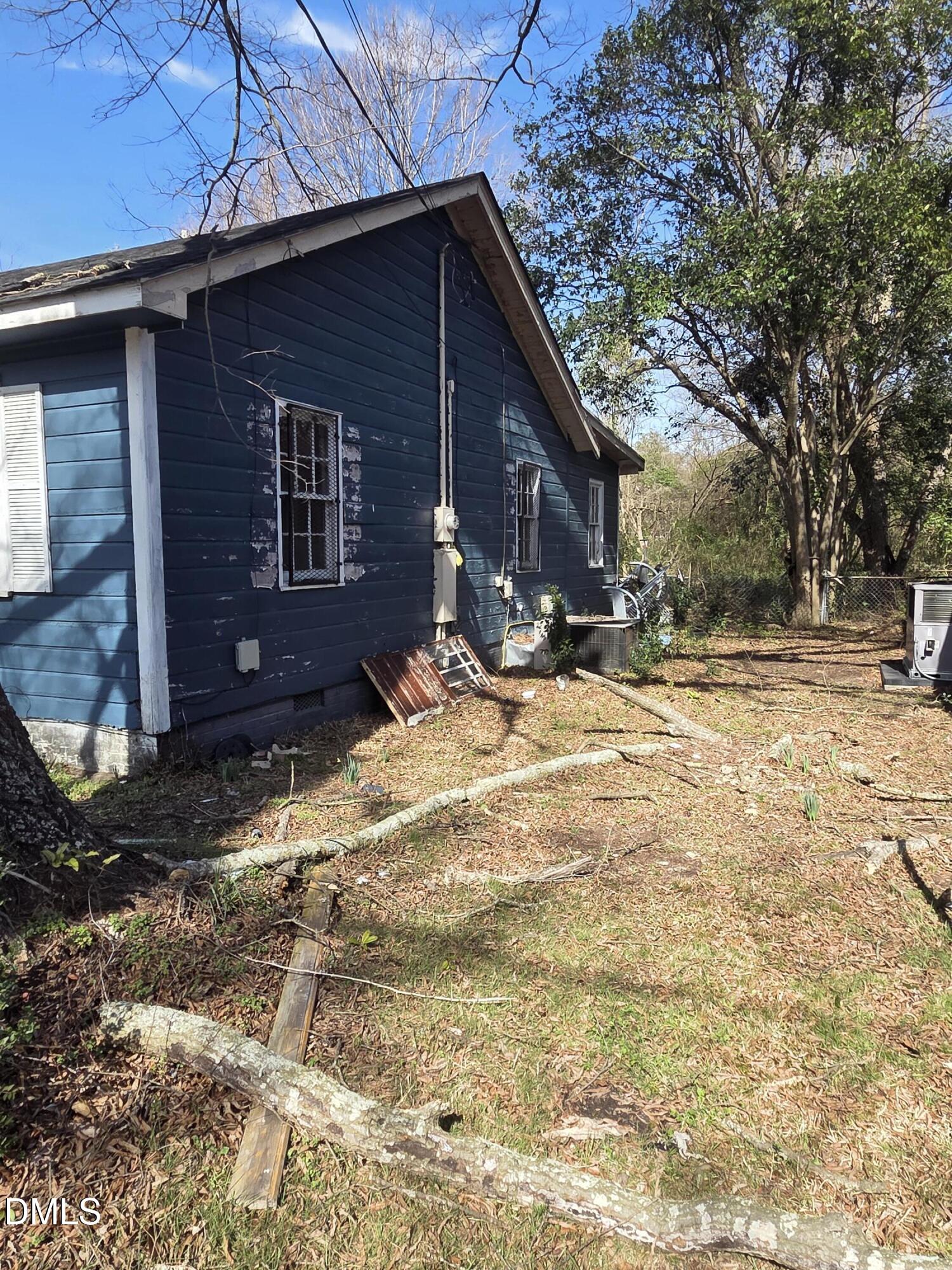 207 East Maple Street Mount Olive, NC 28365 - Photo 11 of 11 a view of house with yard