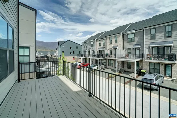 a view of a houses with a balcony