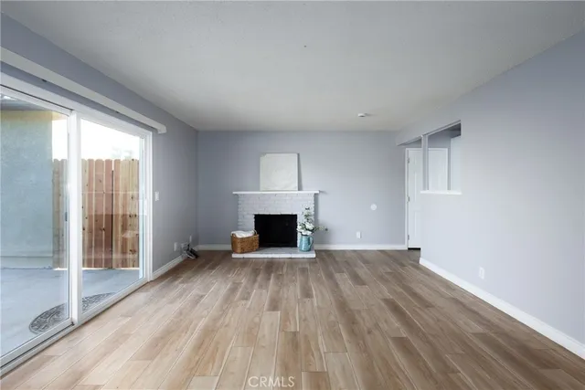 a kitchen with a sink a stove and cabinets