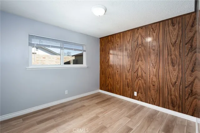 a bathroom with a sink mirror and toilet