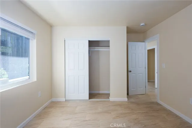 a view of a room with wooden walls