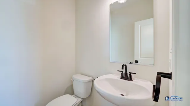 a bathroom with a sink and a toilet
