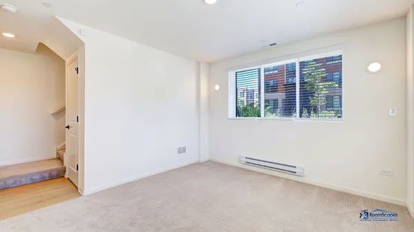 a view of a balcony with floor to ceiling window