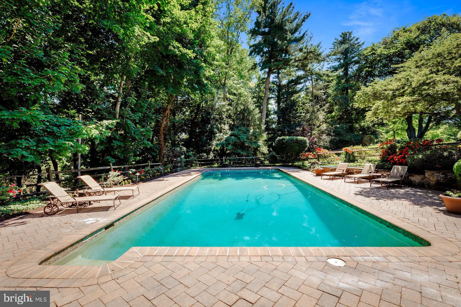 1700 Old Welsh Road Huntingdon Valley, PA 19006 - Photo 65 of 105 a view of a swimming pool with a lounge chair