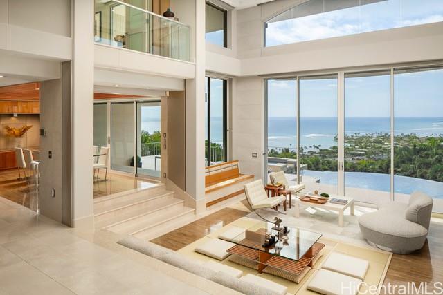 360 Puuikena Drive Honolulu, HI 96821 - Photo 2 of 20 Sunken living area with pool and ocean views opening to the adjacent dining area.