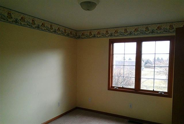 5168 East Walden Road Byron, IL 61010 - Photo 7 of 9 a view of a window in an empty room