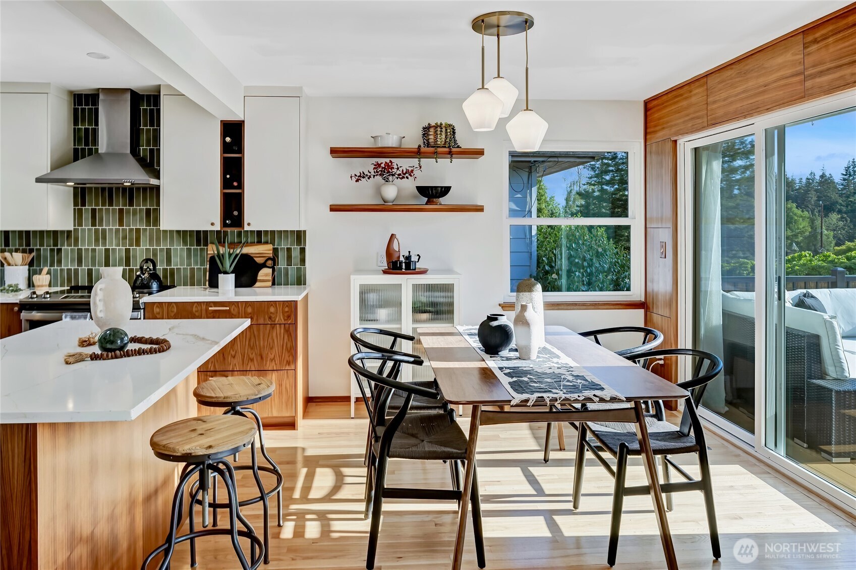 7571 45th Avenue Southwest Seattle, WA 98136 - Photo 17 of 40 a dining room with furniture a chandelier and wooden floor