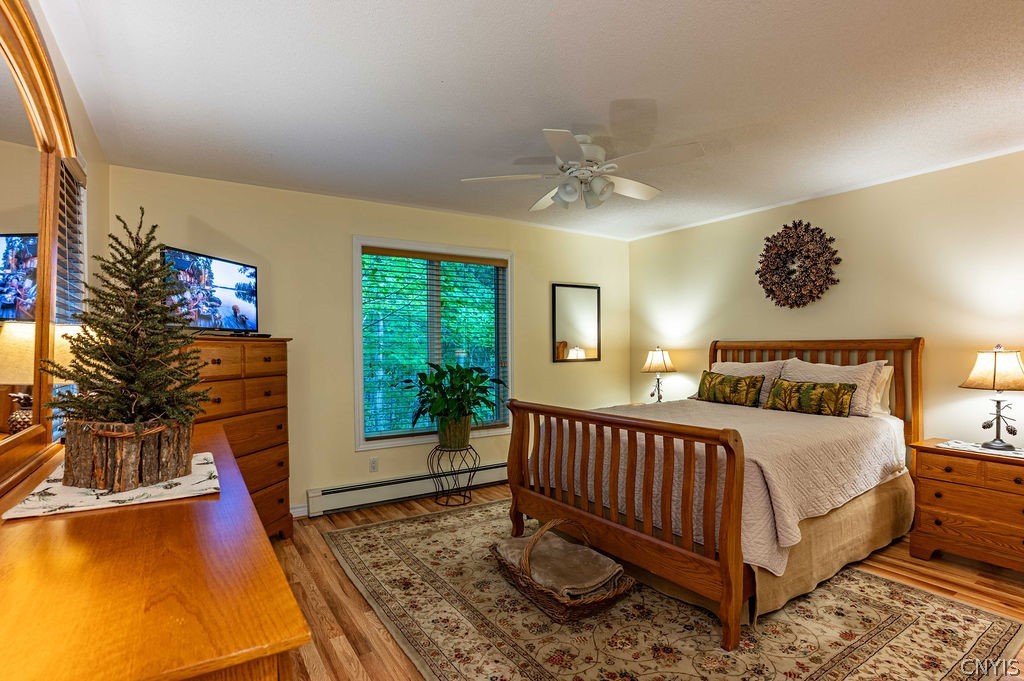 105 Mingo Road Webb, NY 13420 - Photo 17 of 32 Primary Bedroom Suite