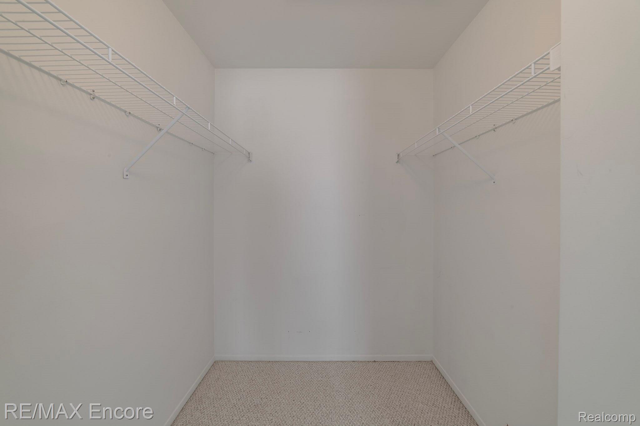 90 Pine Tree Ridge, Unit 4 Waterford, MI 48327 - Photo 12 of 18 6x6 walk in closet in master.