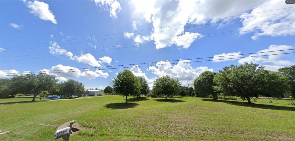 Tiger Lake Rd Lake Lake Wales, FL 33898 - Photo 2 of 2 a view of a golf course with a lake